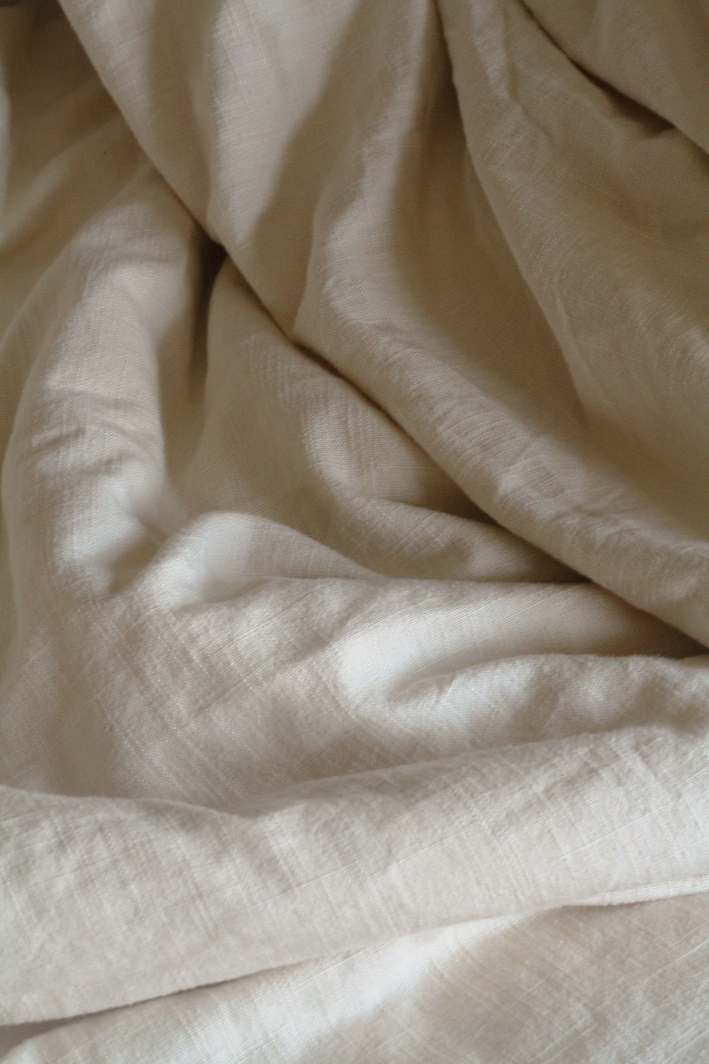 Close view of a beige linen weave